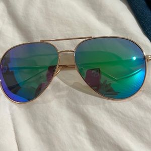 Gold aviator glasses with bluish lens